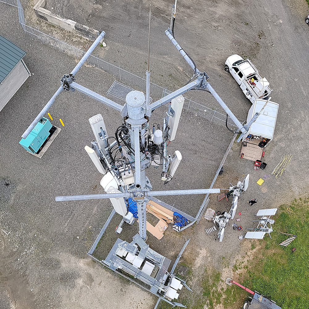 Aerial view of a cell tower being constructed.